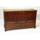 A 19TH CENTURY OAK COFFER BACK, with a plain plank top, triple panel front and two drawers, on