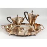 A VERY GOOD FIVE PIECE SILVER TEA SET by BARKER ELLIS, comprising oval two-handled tea tray, 32ins