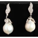 A PAIR OF SILVER BAROQUE PEARL DROP EARRINGS.