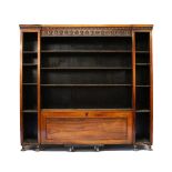 A GOOD 19TH CENTURY ROSEWOOD BREAKFRONT STANDING BOOKCASE, with anthemion carved frieze, wide open