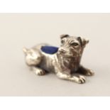 A SILVER DOG PIN CUSHION.