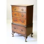 A GEORGIAN DESIGN SMALL WALNUT CHEST ON STAND, 20TH CENTURY, with four long drawers, on cabriole