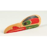 A RED INDIAN BIRD HEAD CARVING, by Harold Patrick. 25cms long.