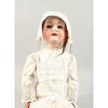 HEUBACH KOPPELSDORF, 302-6.5 A BISQUE HEADED DOLL, with long hair and articulated body. 2ft 3ins