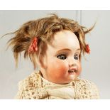 PETIT ANGLAISE BABY DOLL. Mark J.V. with anchor, bisque head and articulated body. 4ft 2ins long.