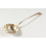 A GEORGE III BRIGHT CUT LADLE, with shell bowl. London 1786.