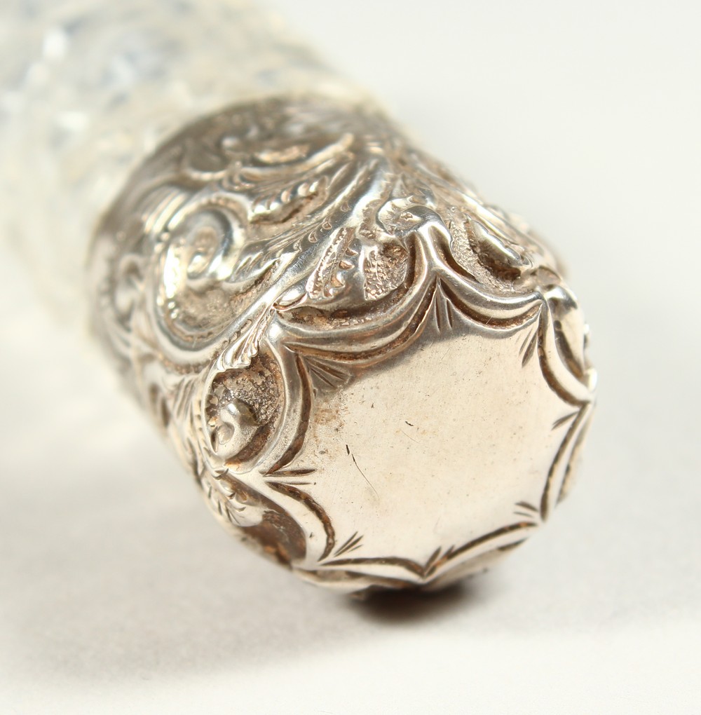 A VICTORIAN PLAIN CUT GLASS SCENT BOTTLE with repousse silver top and plain glass stopper. - Image 5 of 10