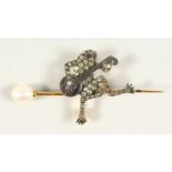 A 9CT GOLD AND SILVER FROG BROOCH, with diamonds, peridots and pearls.
