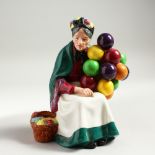 A ROYAL DOULTON FIGURE 'THE OLD BALLOON SELLER', No. HN1315, Designed by L. Harradine, First