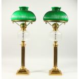 A PAIR OF VICTORIAN STYLE BRASS AND GLASS CORINTHIAN COLUMN ELECTRIC TABLE LAMPS, modelled as oil