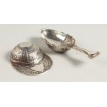 A NOVELTY SILVER JOCKEY CAP CADDY SPOON and A SPOON (2).