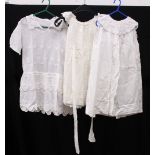 THREE CHILD'S EDWARDIAN/VICTORIAN COTTON DAY DRESSES, all with handmade lace collars.