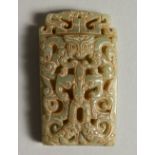 A CARVED AND PIERCED JADE PENDANT. 7cms high.