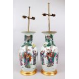 A PAIR OF 19TH CENTURY CHINESE FAMILLE VERTE / ROSE PORCELAIN VASES / LAMPS, decorated with six