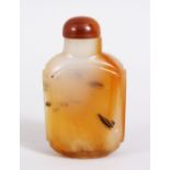 A 19TH / 20TH CENTURY CHINESE CARVED SOAPSTONE / AGATE SNUFF BOTTLE, with hard stone stopper and