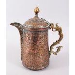 AN EARLY ISLAMIC / TURKISH BRASS / COPPER JUG, with a dragon style handle, 23cm high.