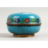 A SMALL CHINESE BLUE GROUND CLOISONNE ENAMEL BOX AND COVER. 3.5ins diameter.