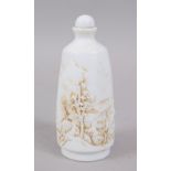 A GOOD CHINESE BLANC DE CHINE PORCELAIN MOULDED SNUFF BOTTLE, the body depicting a moulded landscape