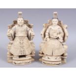 A PAIR OF LATE 19TH CENTURY CHINESE CARVED IVORY SEATED EMPEROR QIANLONG AND EMPRESS,heavily