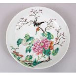 A GOOD REPUBLIC PERIOD STYLE FAMILLE ROSE PORCELAIN PLATE, decorated with scenes of birds amongst