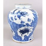 A LARGE CHINESE BLUE & WHITE PORCELAIN VASE, the body decorated with scenes of animals, the base