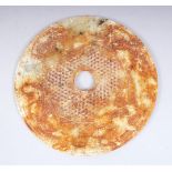 A GOOD 19TH / 20TH CENTURY CHINESE JADE / JADE LIKE CARVED BI DISK, with carved decoration to both
