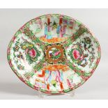 A 19TH CENTURY CHINESE CANTON PORCELAIN OVAL DISH with four panels of birds, butterflies and