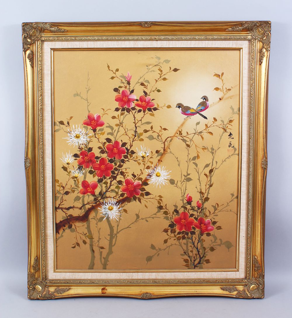 A 20TH CENTURY CHINESE OIL ON CANVAS PAINTING OF BIRDS IN TREES, housed within a moulded gilt frame,
