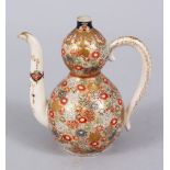 A GOOD JAPANESE MEIJI PERIOD IMPERIAL SATSUMA EWER, with millefluer style decoration, in the form of