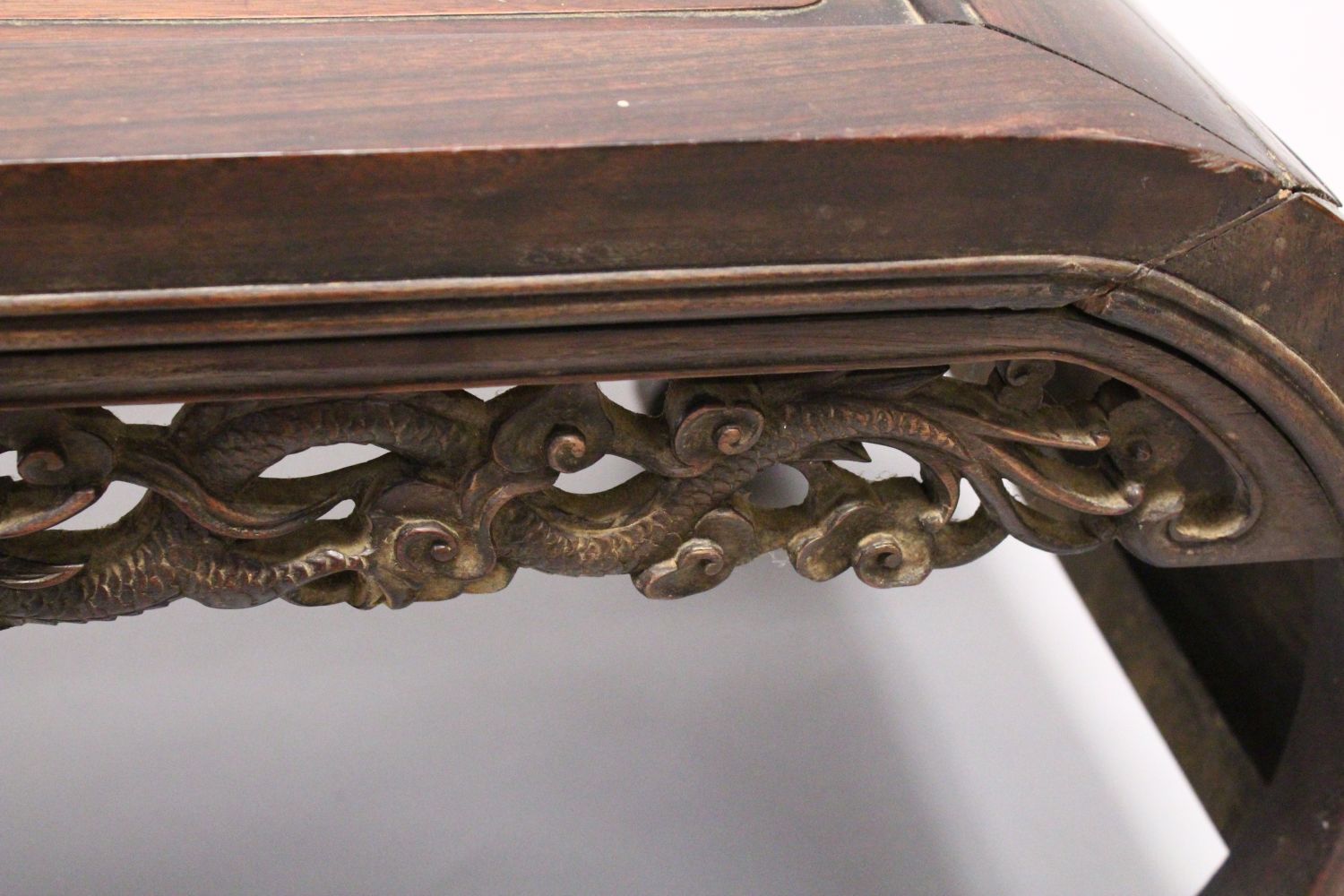 A 19TH CENTURY CHINESE HARDWOOD / PADOUK COFFEE / OPIUM TABLE, feet of scrolling form, the apron - Image 3 of 9