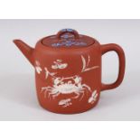 A 19TH CENTURY CHINESE YIXING CLAY TEAPOT & COVER, the body of the tea pot decorated with crabs