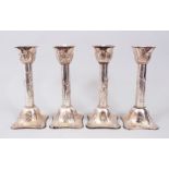 A GOOD SET OF FOUR JAPANESE SOLID SILVER CANDLESTICKS BY ARTHUR & BOND YOKOHAMA, the body of thee