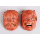 TWO JAPANESE MEIJI / TAISHO PERIOD CARVED & LACQUERED MINATURE NOH MASKS, detailed with inlaid