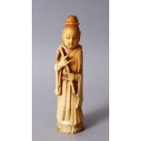 A GOOD 19TH CENTURY CHINESE CARVED IVORY / TOOTH FIGURE OF GUANYIN, stood holding an instrument,