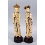 A PAIR OF 19TH CENTURY CHINESE CARVED IVORY EMPEROR AND EMPRESS FIGURES, the emperor stood in