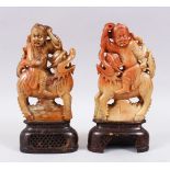 PAIR OF 20TH CENTURY CHINESE CARVED SOAPSTONE FIGURES OF IMMORTALS, the immortals riding upon the