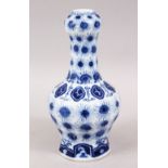A RARE 19TH CENTURY CHINESE DELFT STYLE PORCELAIN TULIP SHAPED VASE, decorated with flora, the
