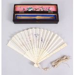 A 19TH CENTURY CHINESE CANTON CARVED IVORY & EMBROIDERED SILK FAN, the fan with carved stems