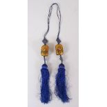 A SET OF 19TH / 20TH CENTURY CHINESE REVERSE PAINTED GLASS DROPS, the tassel set with two glass