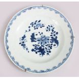 A GOOD 18TH CENTURY CHINESE BLUE & WHITE PORCELAIN PLATE, decorated with floral scenes, mounted with