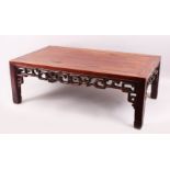 A GOOD 19TH CENTURY CHINESE HARDWOOD OPIUM / COFFEE TABLE, the side apron carved and pierced,