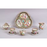A 19TH CENTURY CHINESE CANTON FAMILLE ROSE PORCELAIN TEA SET, Consisting of one teapot 9.5cm high, 1