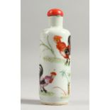 A CHINESE PORCELAIN SNUFF BOTTLE AND STOPPER painted with chickens.