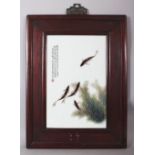 A CHINESE WOOD FRAMED PORCELAIN PLAQUE IN THE MANNER OF DENG BISHAN, the porcelain decorated with