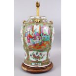 A 19TH CENTURY CHINESE CANTON FAMILLE ROSE PORCELAIN TEMPLE JAR / VASE / LAMP, the body of the