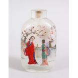 A 19TH / 20TH CENTURY CHINESE REVERSE PAINTED GLASS SNUFF BOTTLE, the bottle depicting scenes of