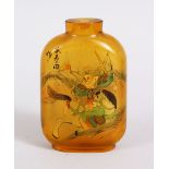 A 19TH / 20TH CENTURY CHINESE REVERSE PAINTED GLASS SNUFF BOTTLE, decorated with scenes of warrior