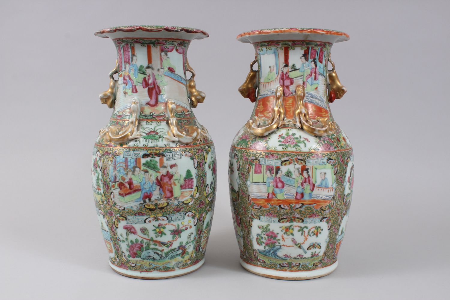 A PAIR OF 19TH CENTURY CHINESE CANTON FAMILLE ROSE VASES, decorated with panels of figures within - Image 3 of 6