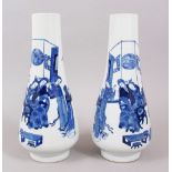 A GOOD PAIR OF 19TH CENTURY CHINESE BLUE & WHITE PORCELAIN VASES, the body's with decoration