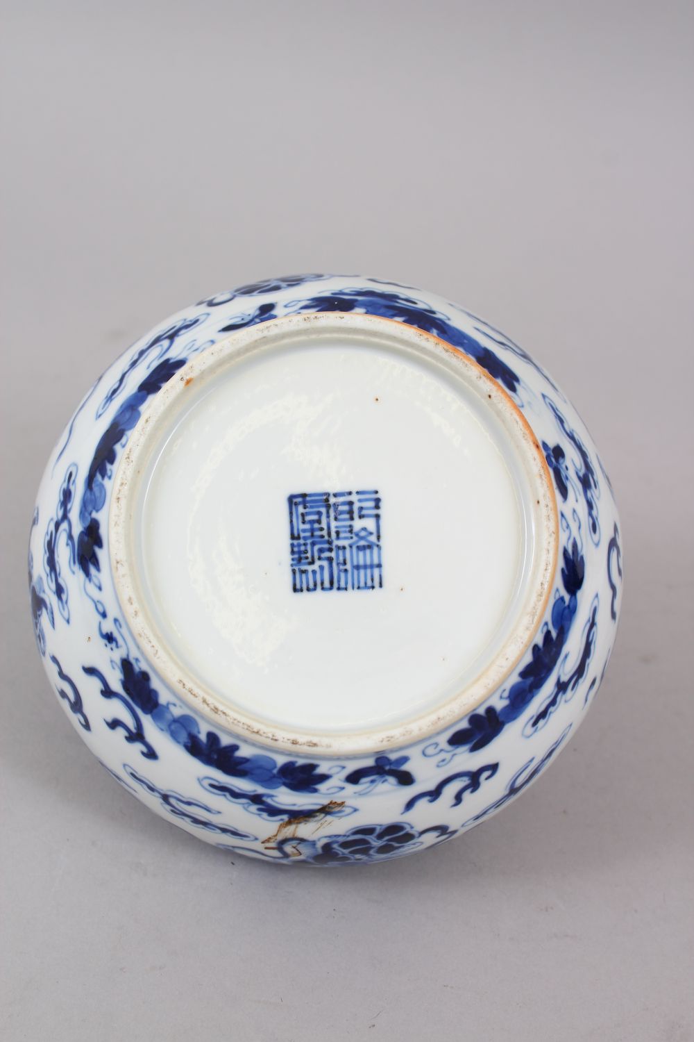 A 19TH CENTURY CHINESE BLUE & WHITE JAR AND COVER, decorated with scenes of lion dogs amongst - Image 6 of 8